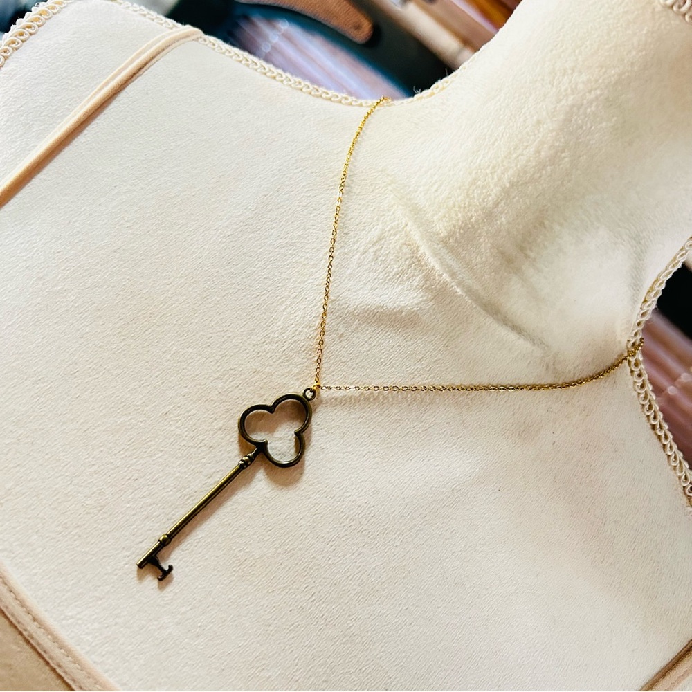 Vintage brass skeleton key on chain necklace